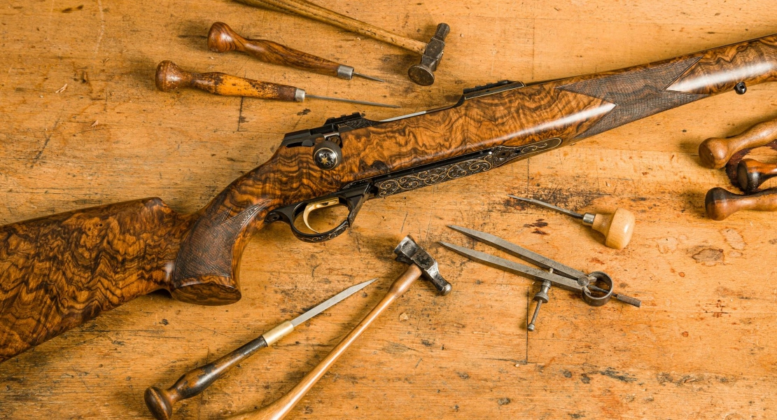 a weapon and tools on the desk