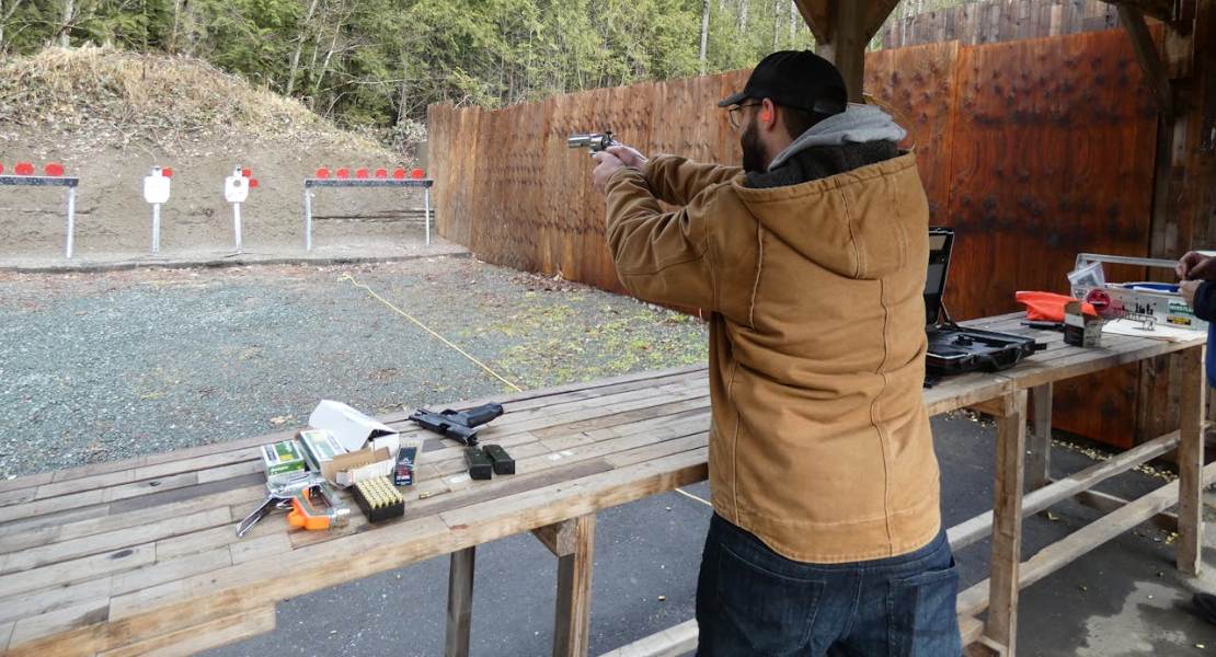 a man shooting the target