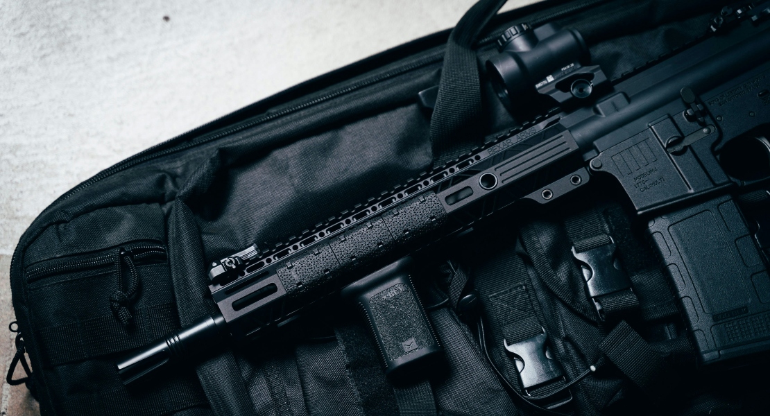 A close-up of a rifle placed in a rifle bag.