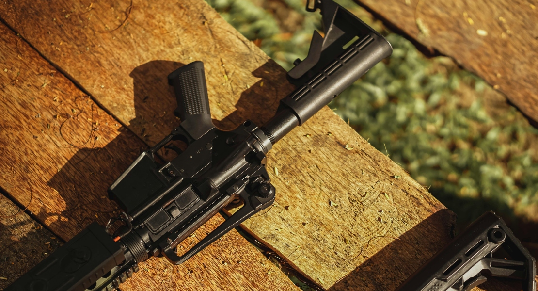 A close-up of DI vs piston AR-15 parts.