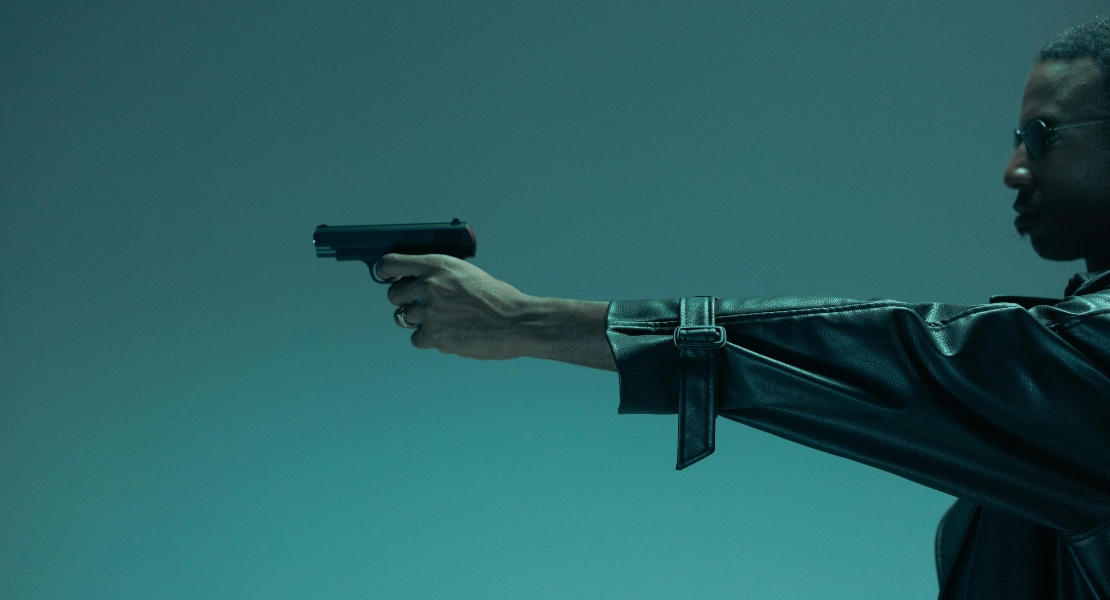 A person holding a gun.