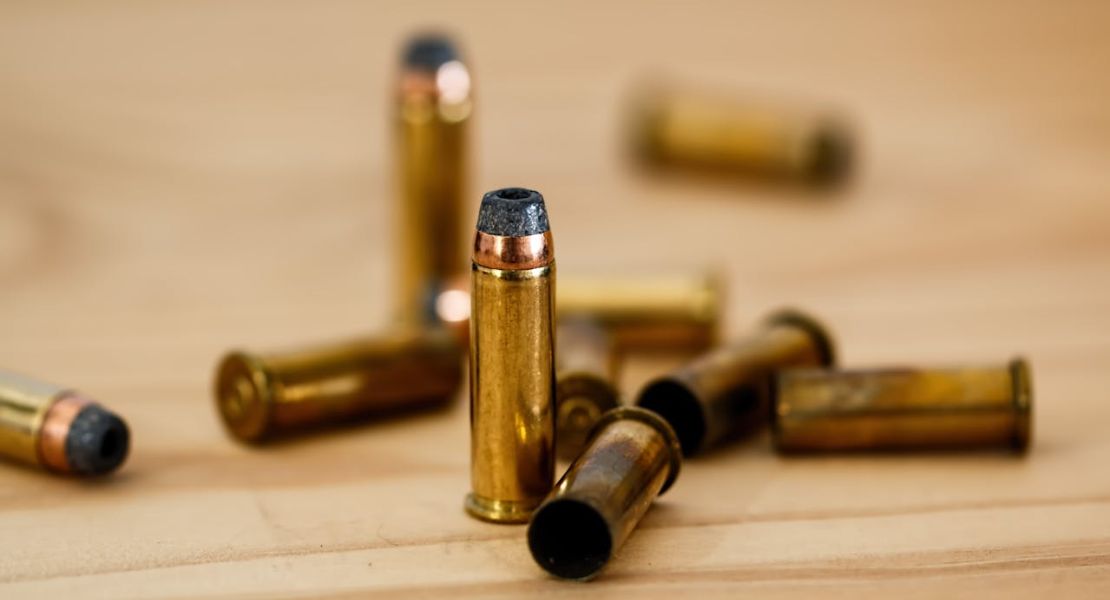 Empty bullets on a desk.