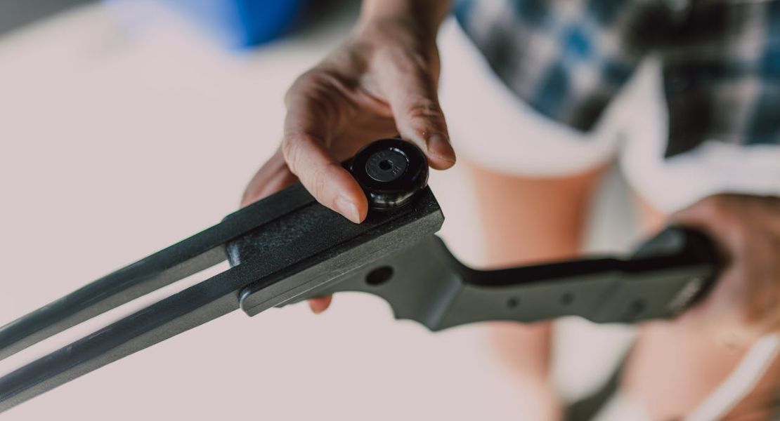 a person checking for AK malfunctions