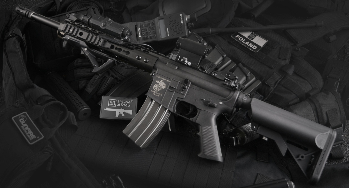 An AR-15 rifle showing a difference between AR-15 upper vs lower receiver.