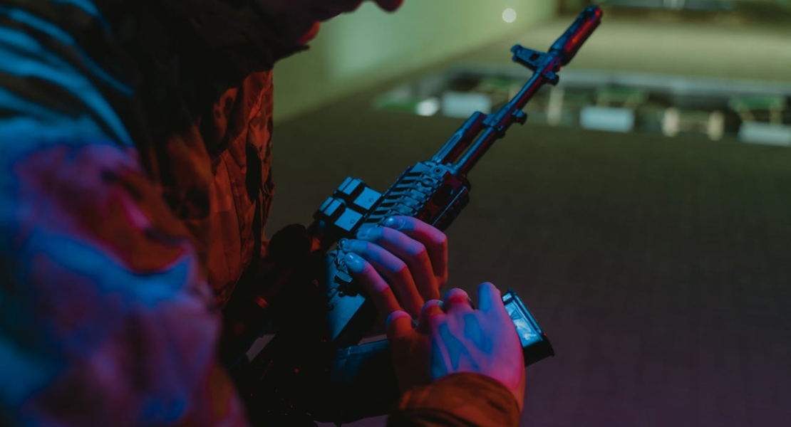 a man holding a weapon