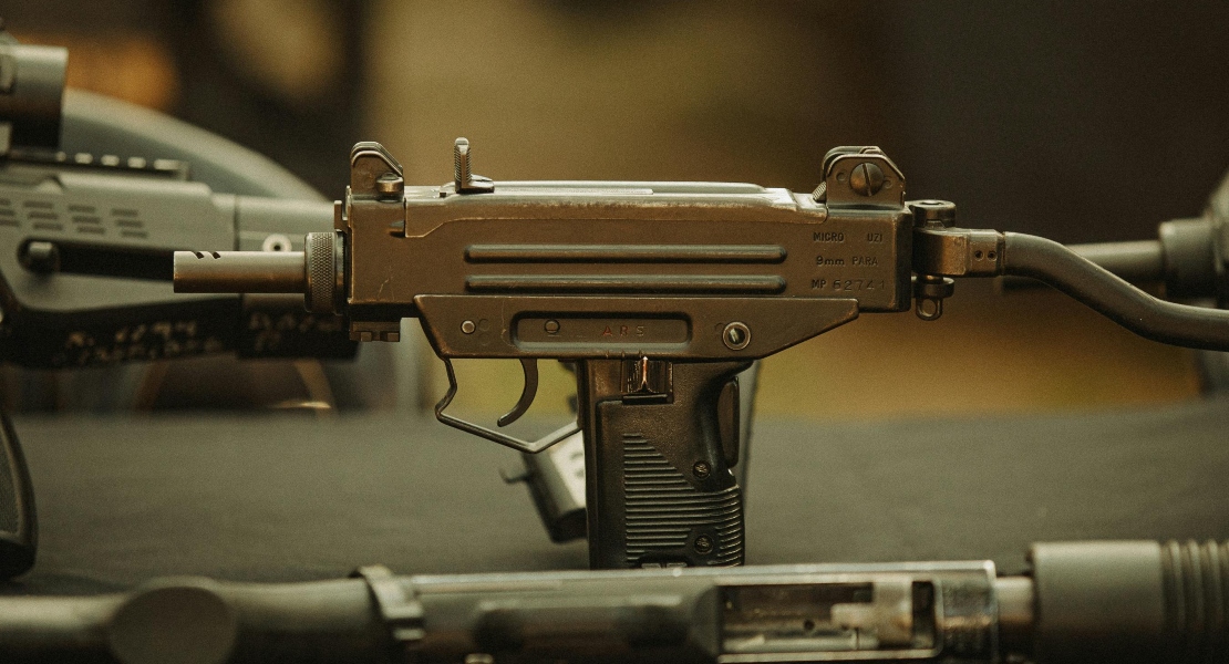 A close-up of a gun trigger.