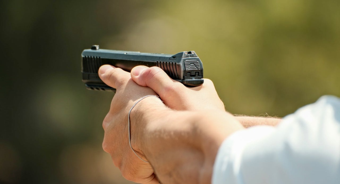 a person holding a gun