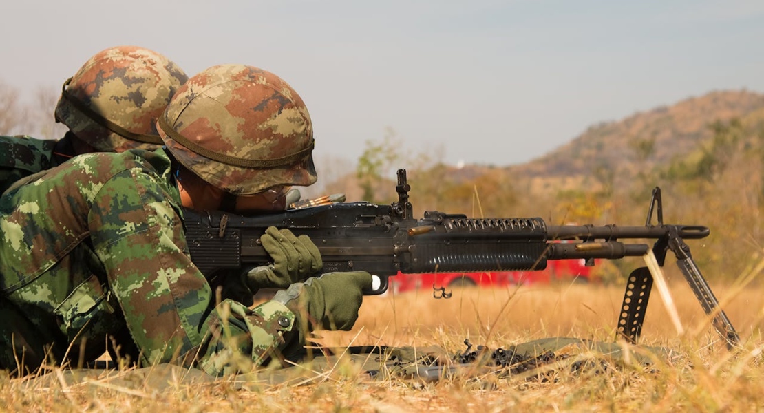 military men shooting from military firearms that failed in the civilian market