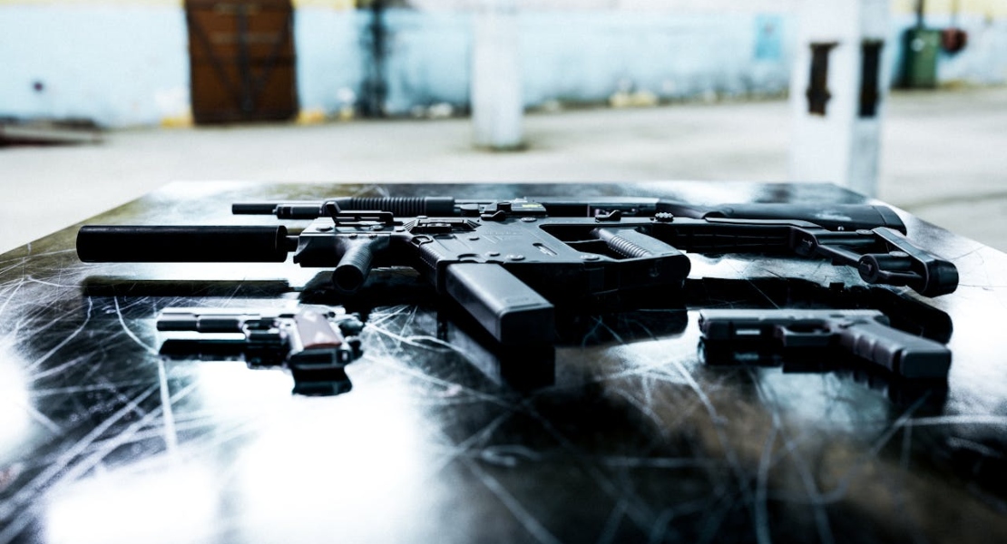 a few weapons on the desk