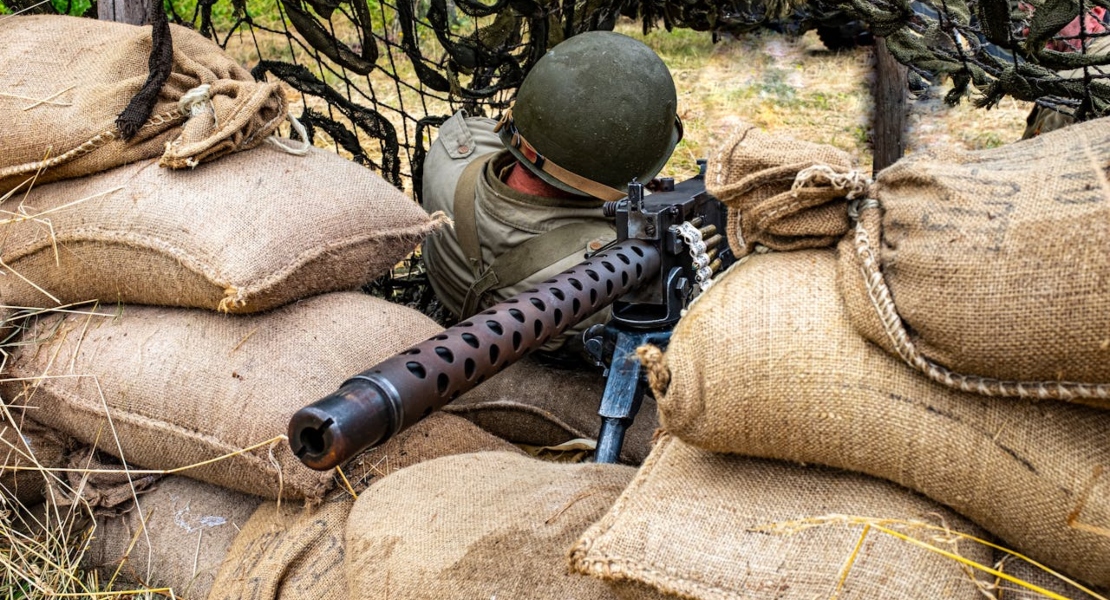 military man holding a rifle