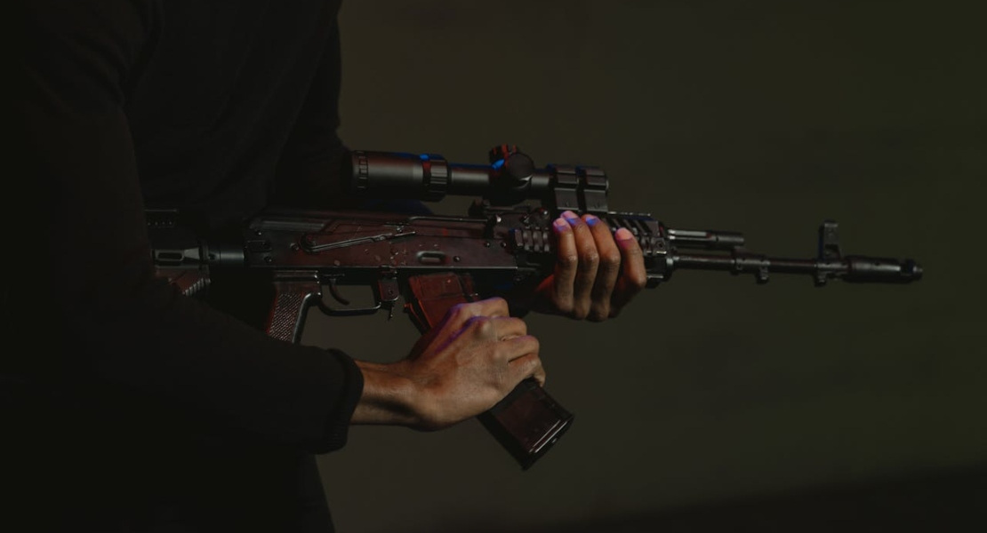 a man holding a weapon