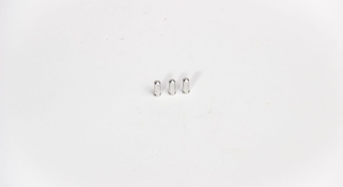 few rounded detents on a white surface