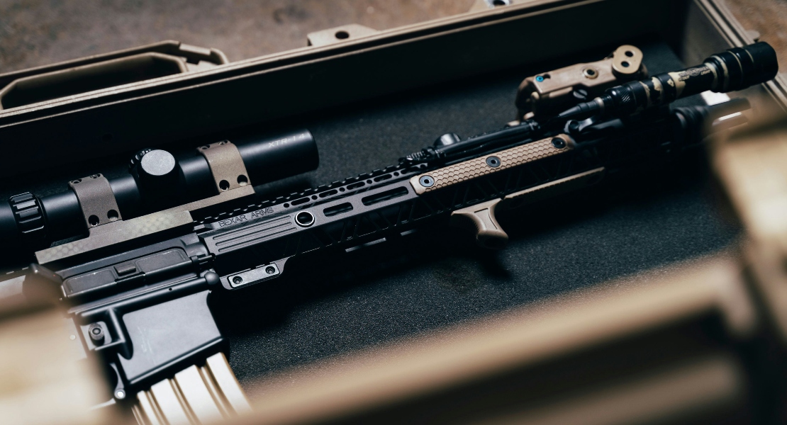 A rifle placed inside a foam-lined hard case for long term firearm storage.