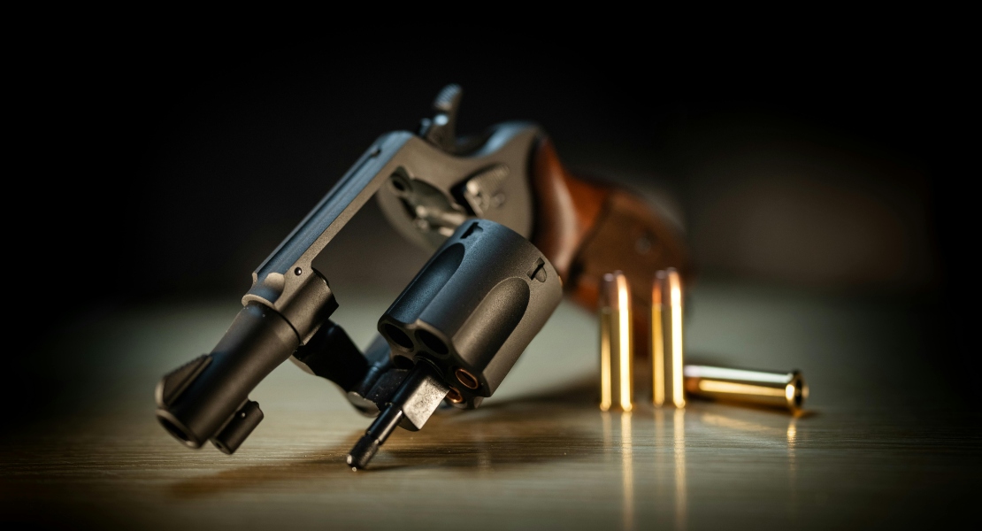 Unloaded firearm with open action shown during pre range firearm inspection.