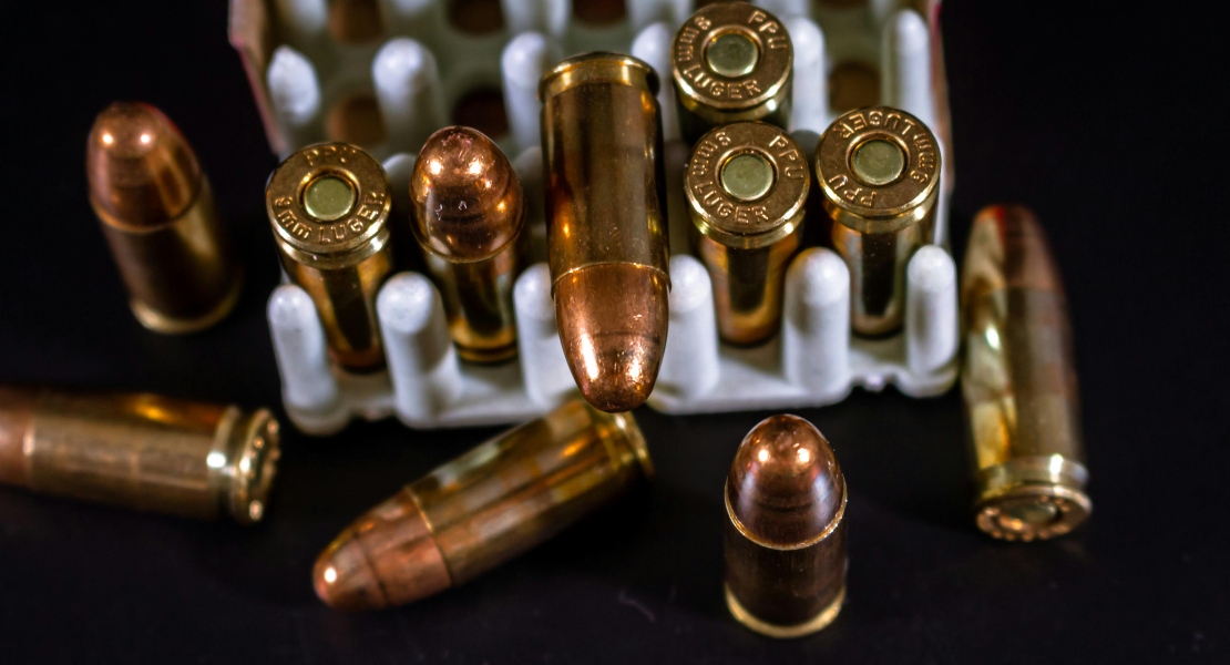 Correct caliber ammunition displayed for safe use during pre range firearm inspection.