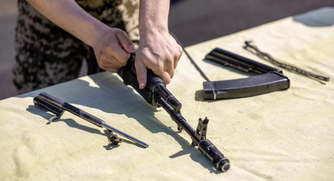 a man assembling a rifle