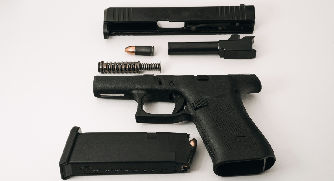 disassembled firearm parts showing differences in fit and specifications