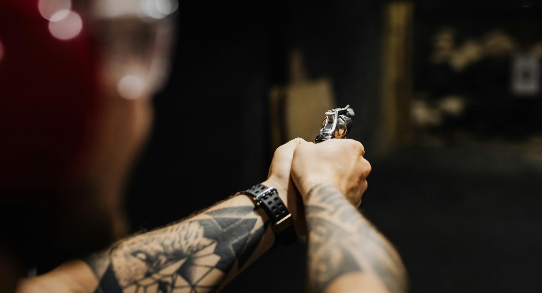 A person holding a gun.