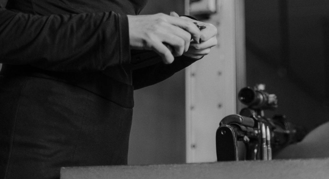 a woman working on a light primer strikes in an MP5 super safety build