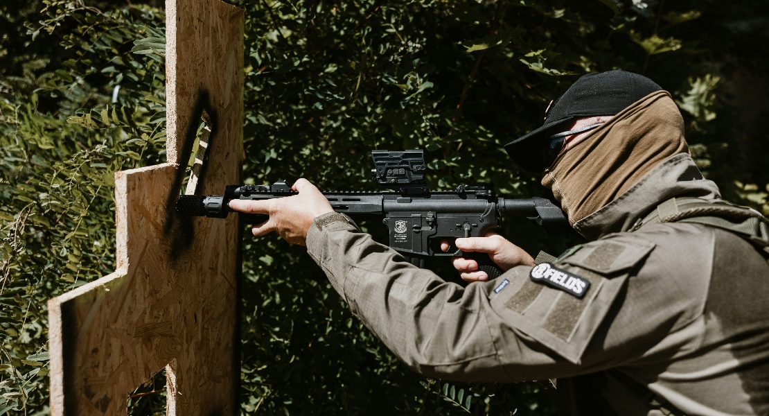 Shooter running an AR-15 super safety build where buffer weight directly affects lever reset timing