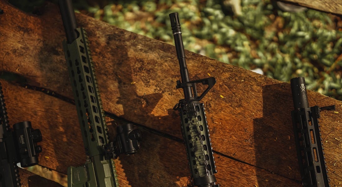 Semiautomatic rifles on a bench