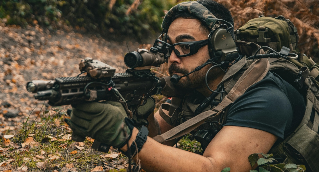 A man holding a rifle.