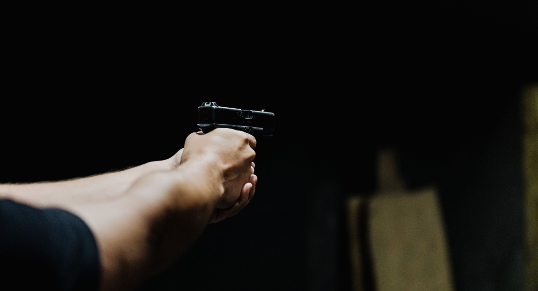 A man holding a gun.