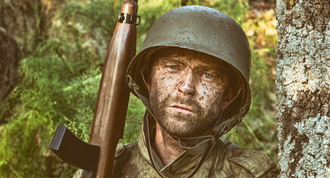 A soldier holding a rifle.