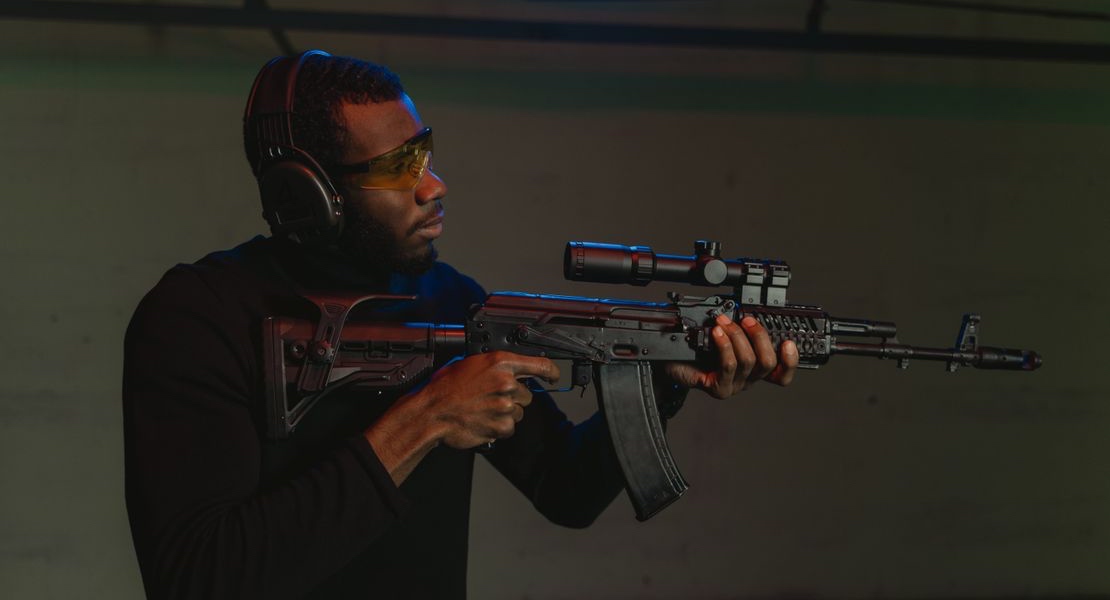 Person running a super safety in competition during a shooting event