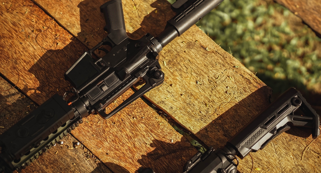 Close-up of an AR-15 super safety suppressor tuning rifle.