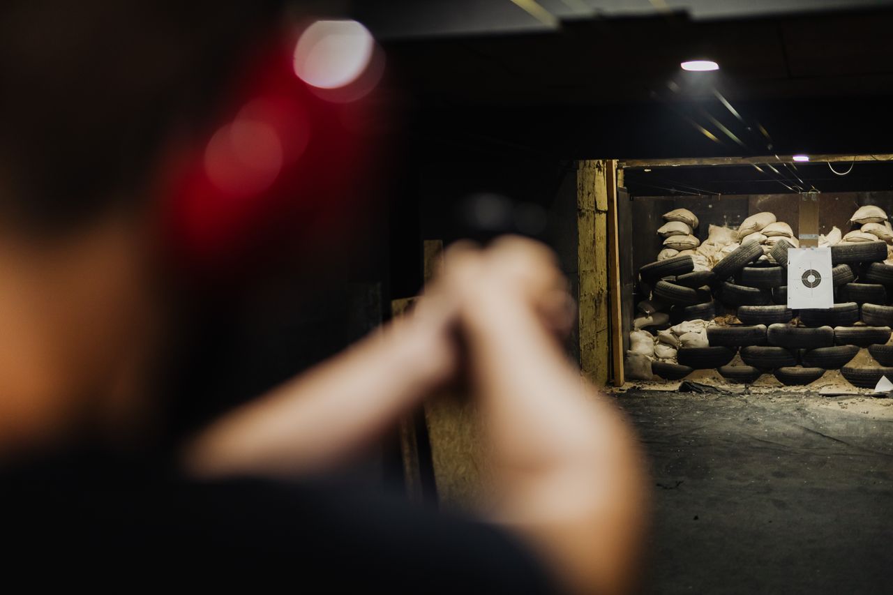 A person at a shooting range