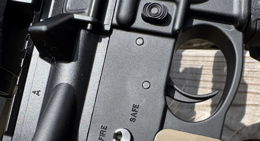 Close-up of AR-9 lower receiver showing the internal geometry differences that affect BCG and buffer compatibility compared to AR-15 builds.