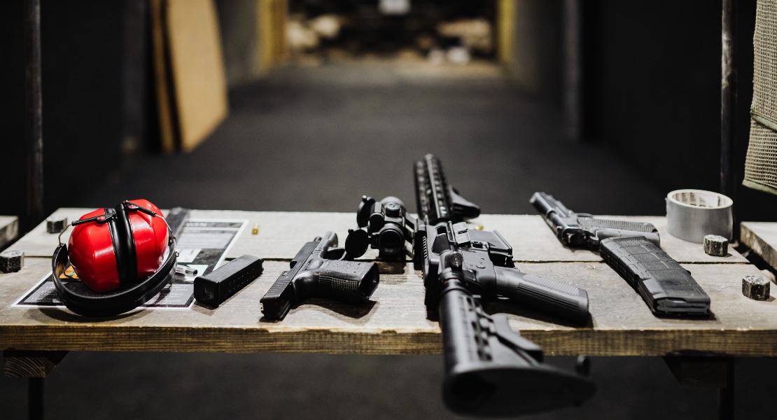 Firearm safely positioned at a shooting bench.
