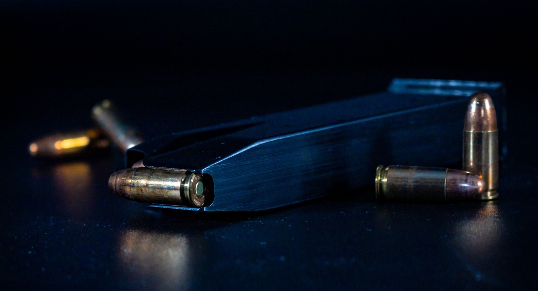 A magazine with 9mm bullets.
