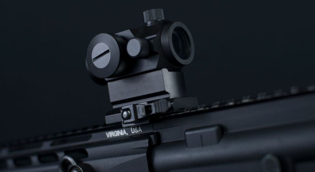 rifle scope and mounting hardware seated on a picatinny rail, the interface that determines optic mount repeatability