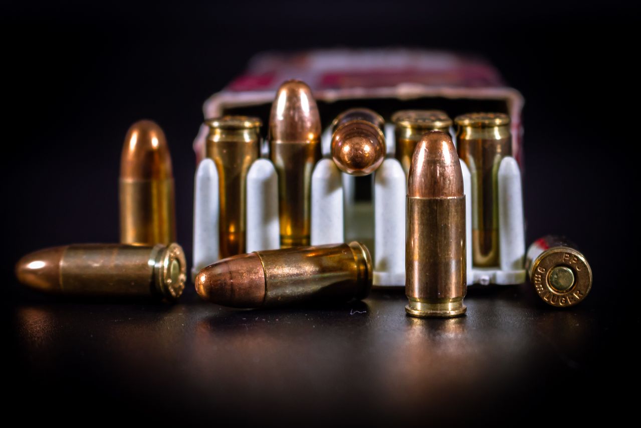 a detailed close-up of copper ammunition bullets